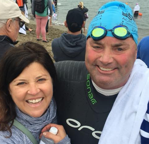 Dan smiles in his swim cap