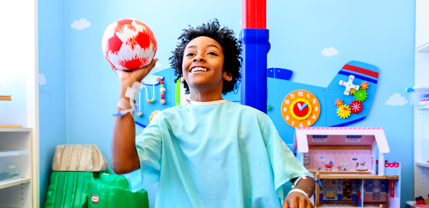 New hero image of a patient playing with a ball