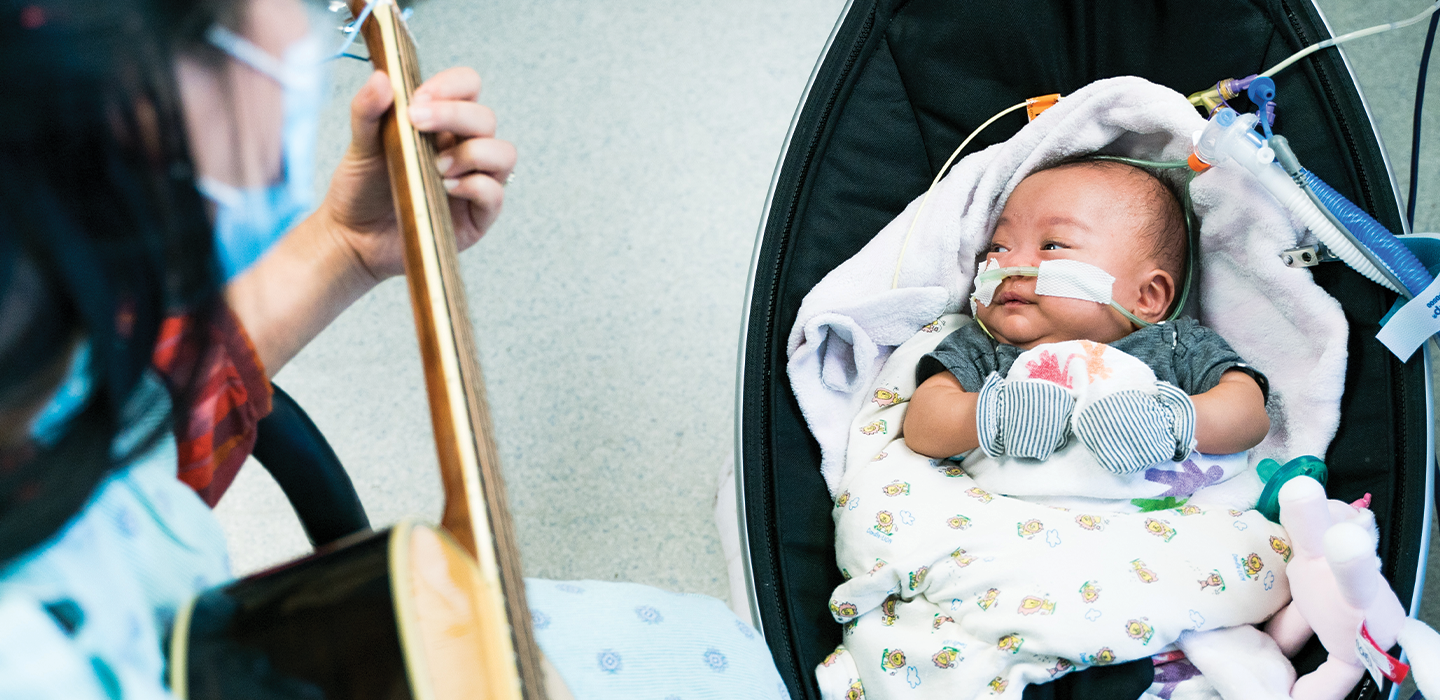 Micaela at a music therapy session