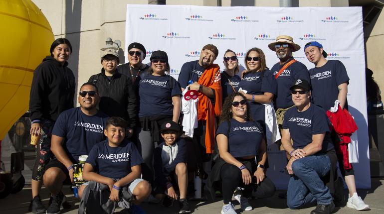 Marriott International employees celebrate the Torch Relay