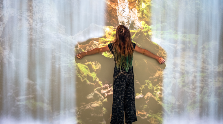 a young girl in an immersion room