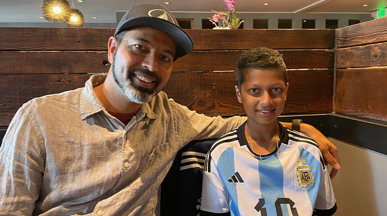 Nirav and Tej, now cancer free and back on the soccer pitch, in 2024.