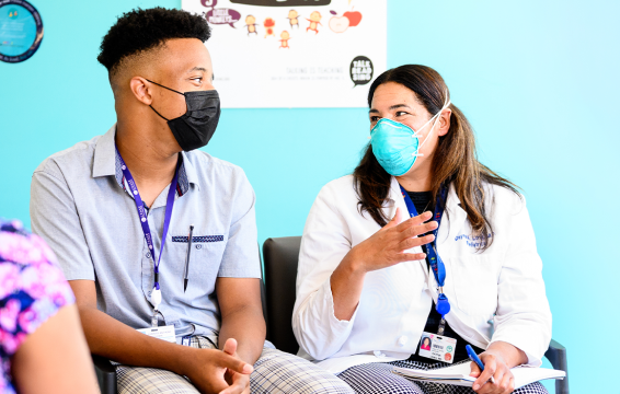 Summer Research Program at UCSF Benioff Children's Hospitals, an intern chats with Dr. Dayna Long
