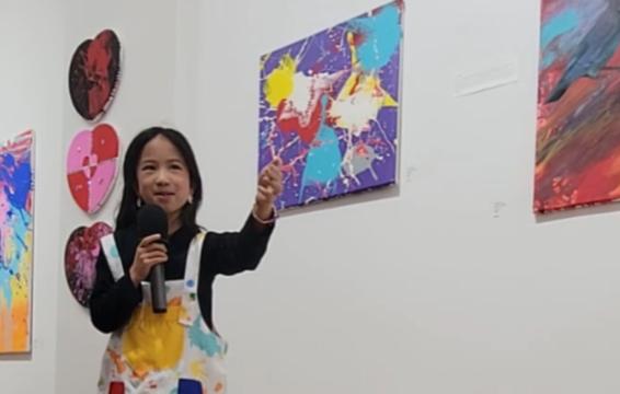 Juliette explaining her art